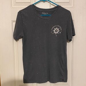 Rebellious One Gray Tee with Sun and Moon Graphic